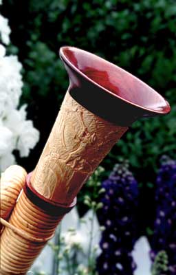RMA Büchel with an African Bloodwood Bell Ring and a Bell Carving by Doug Pauls